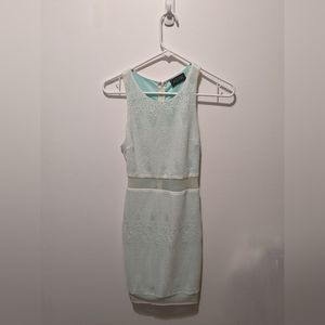 ASTR lacey mini dress with sheer cutouts.